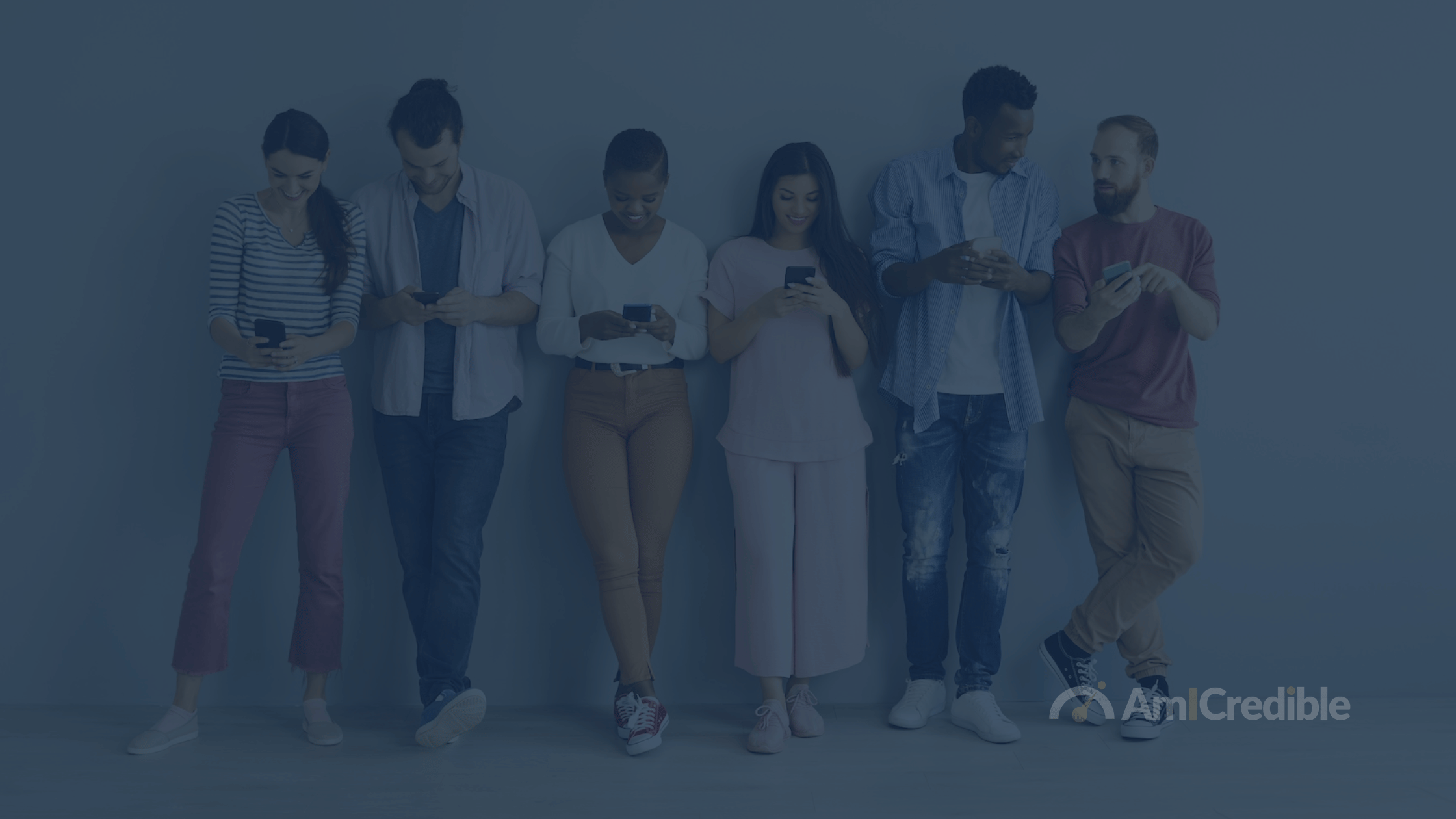 Group of people standing against a call on their phones
